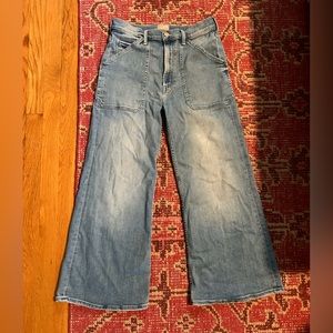 MOTHER denim faded blue flare leg high rise crop.